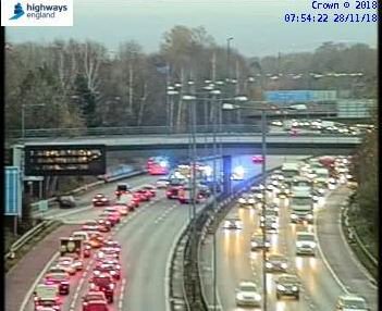 Motorists face delays of more than an hour following M56 crash